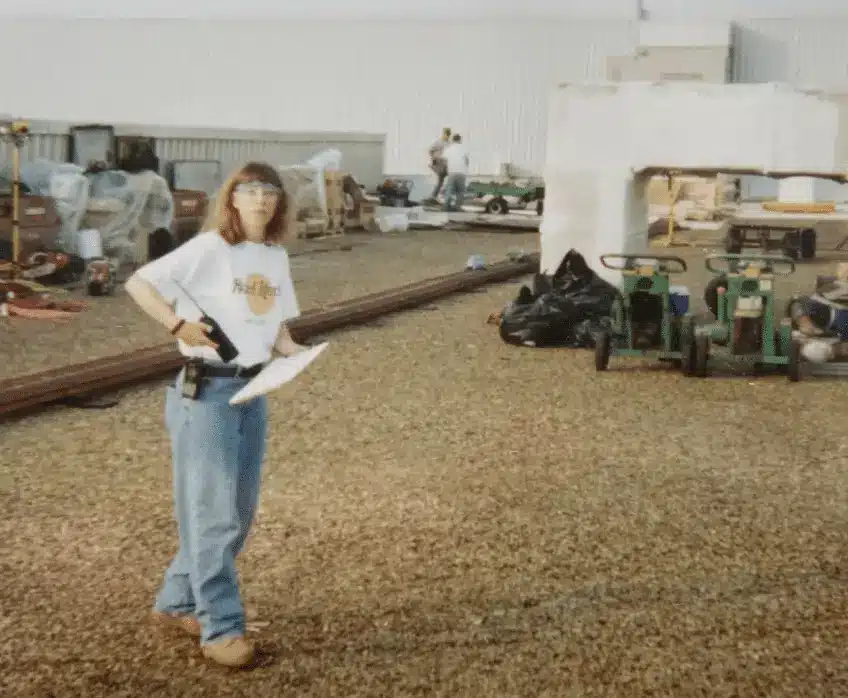 A woman on a jobsite in a vintage photo